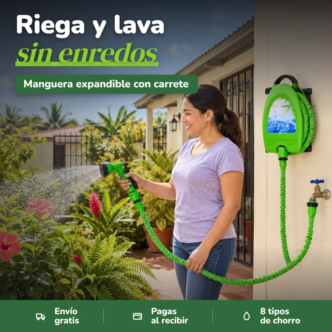 Mujer regando las plantas del jardín con la manguera verde expandible y el carrete en la pared